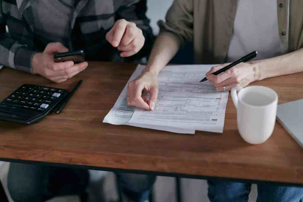 Tax consultant advising a business owner on Trust Fund Recovery Penalty defense strategies